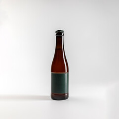 Mockup of 330ml amber beer bottle, on white background with copyspace, real photo