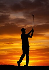 Sunset Silhouette: A lone golfer's silhouette against a fiery sunset, the dramatic contrast highlighting the grace and determination of the sport. Capturing the passion.