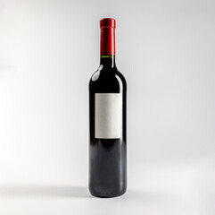 Mockup of classic bottle of red wine garnacha, on white background with copyspace, 750 ml, real photo