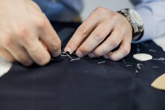 Craftsman tailor at work