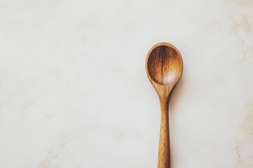 Simple Wooden Spoon on White Marble Background Minimalist Kitchenware Photography