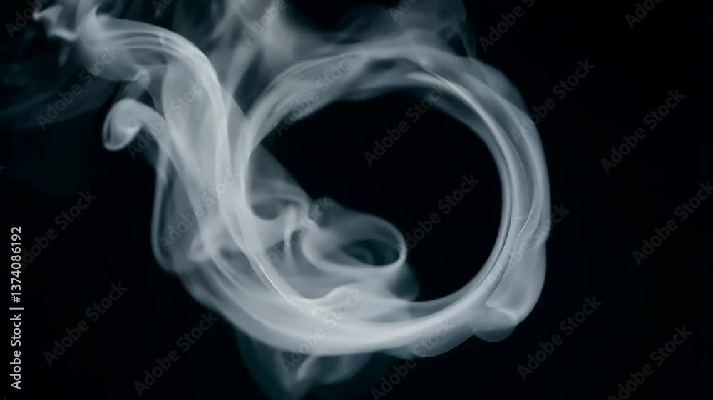 Poster a white ring is suspended in the air, surrounded by a cloud of smoke. the smoke is a mixture of whit