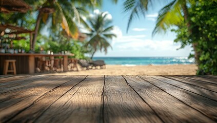 Fototapeta premium Relaxing beach bar scene with wooden table in the foreground. Perfect for summer vacation vibes.