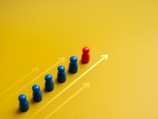 The red different one, leader, leading white peg dolls group, team symbol, with moving forward...
