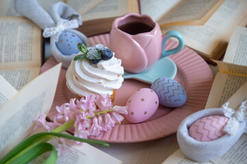 Easter 2025 table decoration for the holiday with flowers and accessories.