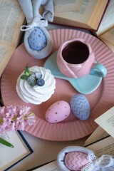 Easter 2025 table decoration for the holiday with flowers and accessories.