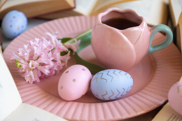 Easter 2025 table decoration for the holiday with flowers and accessories.