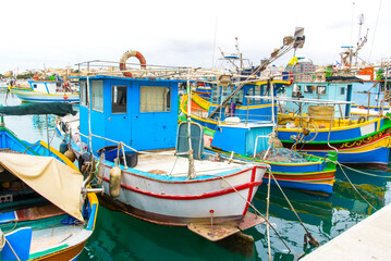 Traditional Fishing Boats in Marsaxlokk Harbour, Malta – Colorful Luzzu Boats