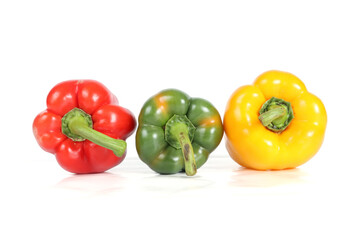 three peppers isolated on white