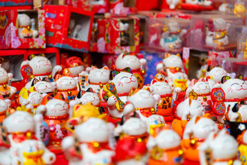 Obraz premium Maneki Neko Lucky Cat Figurines in Hanoi Market