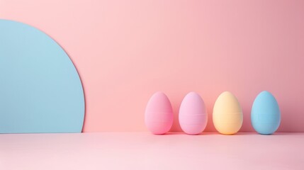 Pastel easter eggs displayed against a simple pink background