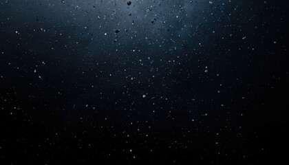 Obraz premium Falling water droplets dark background abstract image aquatic environment close-up fluid dynamics