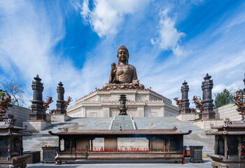 Fototapeta premium Jinding Giant Buddha landscape in Jilin Dunhua Liudingshan Cultural Tourism area 