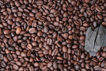 Coffee beans and charcoal, natural production concept