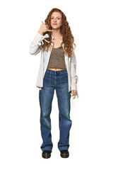 Full-body redhead portrait showing a mobile phone call gesture with fingers.