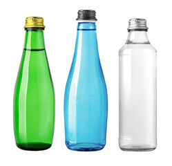 Green, blue and transparent glass bottles standing on white background