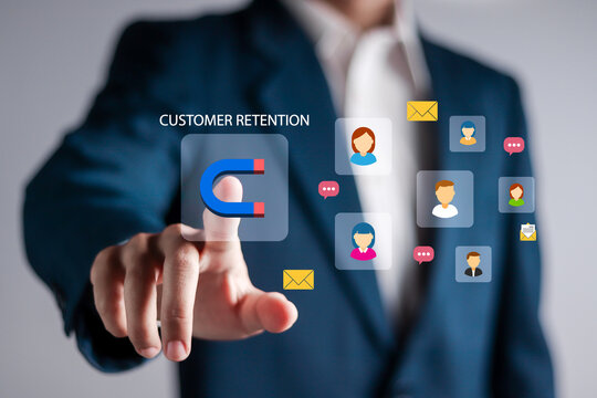 Customer retention concept. Strategy of customers attraction and inbound marketing. Businessman touching online traffic magnet on virtual screen.