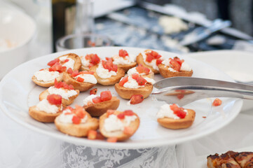Food on a dish served during a buffet catering party