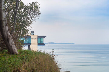 Fototapeta premium A closed area with a panoramic view on the seashore. A tourist place for recreation with a view of the ocean.