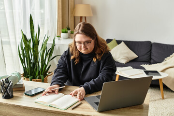 Young woman with Down syndrome confidently studying at home in a cozy environment