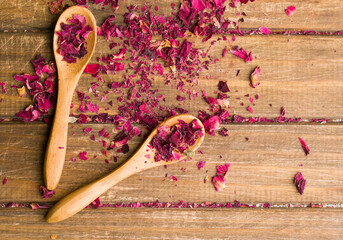 spoons with dried roses