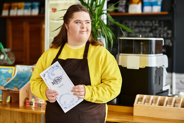 Young woman with Down syndrome exudes confidence while holding menu in vibrant cafe setting