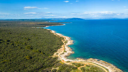 This stunning aerial photo captures the picturesque coastline near Medulin, Istria with...