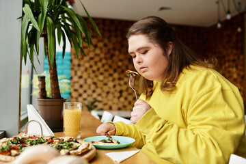 Young woman enjoys a meal in a cozy cafe, embracing her vibrant personality and confidence