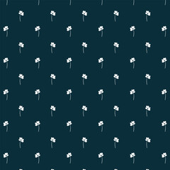 Beautiful vintage floral pattern. Small white flowers . Dark  background. Floral seamless background. An elegant template for fashionable prints