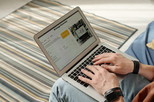 Unrecognizable Male Hands Working On Laptop