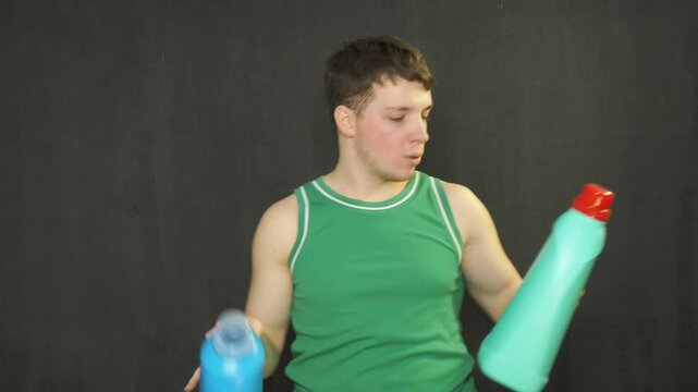 A man chooses a cleaning product for the premises.