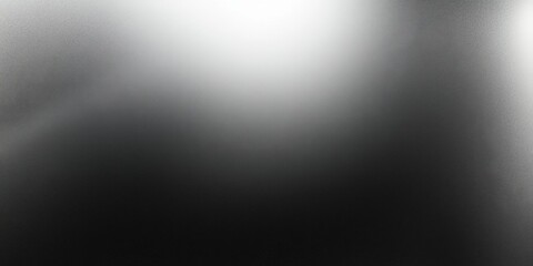 Blurry gray gradient with dark grainy transitions between black and white, offering a minimalistic abstract background with a soft, modern feel.