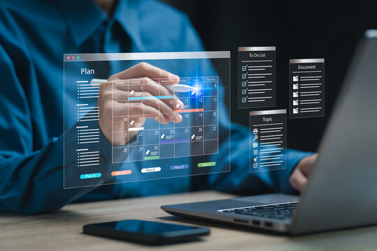 Project management, Calendar plan concept, Businesswomen use laptops prioritise planning of project control checklist highlighting key aspects, Teamwork, Cost management, Goal setting, risk assessment