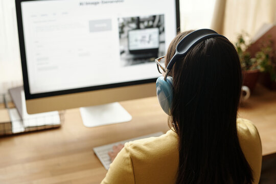 Unrecognizable Girl Using Image Generator on Desktop Computer