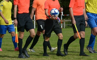 Le corps arbitral au football	