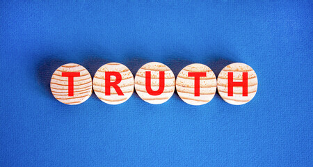 Truth symbol. Concept word Truth on beautiful wooden circles. Beautiful blue table blue background....