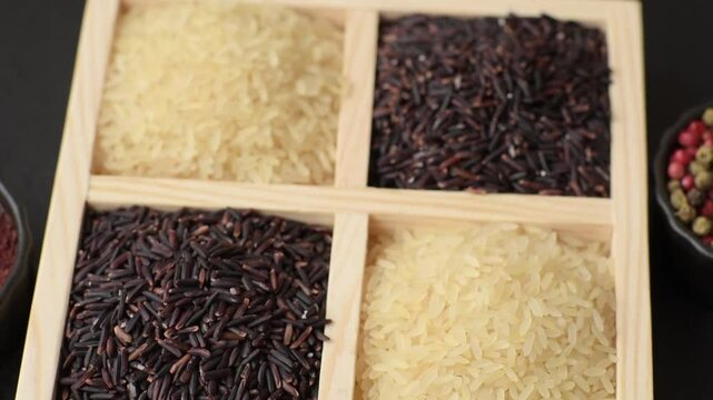 White and red raw rice grains in a ceramic bowl. Rice as an ingredient in Asian organic food