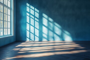 Obraz premium Bright blue room with wooden floor and windows, enhanced by natural daylight and shadow play