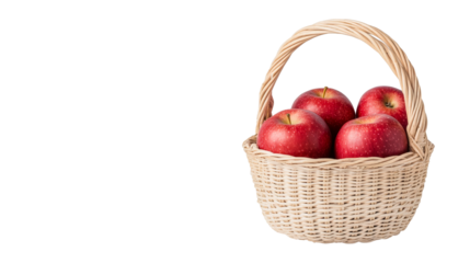 Ripe red apples in a wicker basket against black, cut out transparent