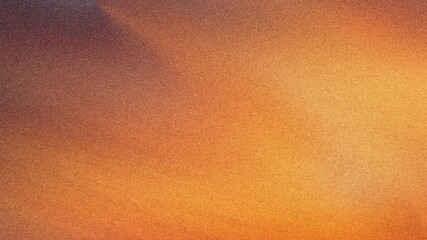 Abstract gradient background with warm tones of orange yellow and brown creating a soft blurred effect