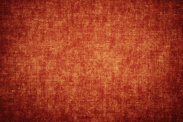 Fototapeta premium A textured, warm-toned fabric surface with a rich, woven appearance, creating a cozy and inviting ambiance.