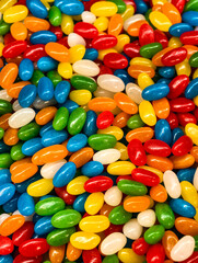 Vibrant Jelly Beans in Macro. Close-up Photo of Colorful Candy Assortment. Sweet Party Treats and Holiday Confectionery Favorites with Mixed Flavors. Stock Photography 