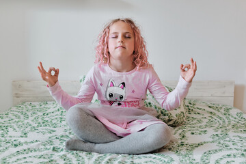 Girl Practicing Relaxation Techniques on Bed at Home