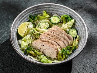 green salad with chicken, cucumber and broccoli