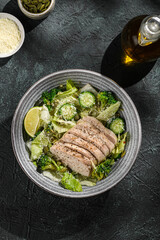 green salad with chicken, cucumber and broccoli