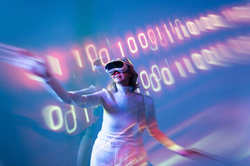 Elderly asian woman exploring the metaverse in VR