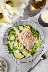 green salad with chicken, cucumber and broccoli