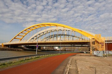 Yellow Hogeweidebrug bridge over the Amsterdam-RijnKanaal canal in Utrecht