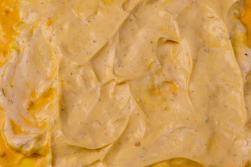 Yellow sauce splashes as a background.