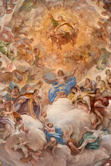 FLORENCE, ITALY - MARCH 18, 2025: The detail of baroque fresco of Jesus in his Glory in the church...